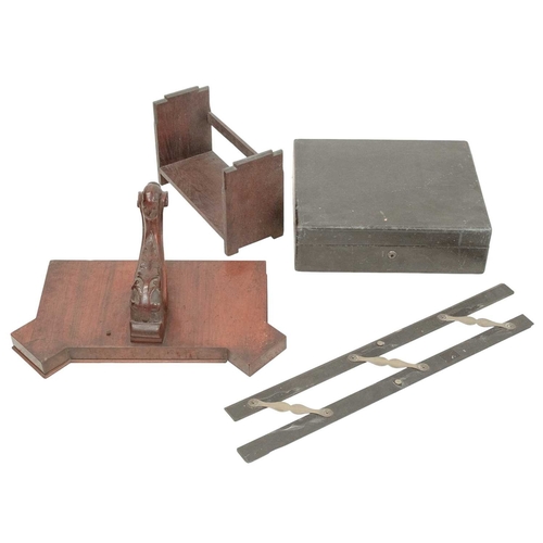 64 - A Victorian walnut wall bracket. With a carved cabriole support, 47 x 26cm, together with an ebony a... 