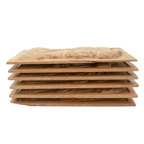 656 - A group of six carved oak panels. 20th century, carved with male or female masks, each 27.5 x 19cm (... 