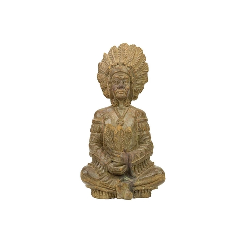 669 - An American carved softwood figure of a seated native American chief. 19th century, probably a tobac... 