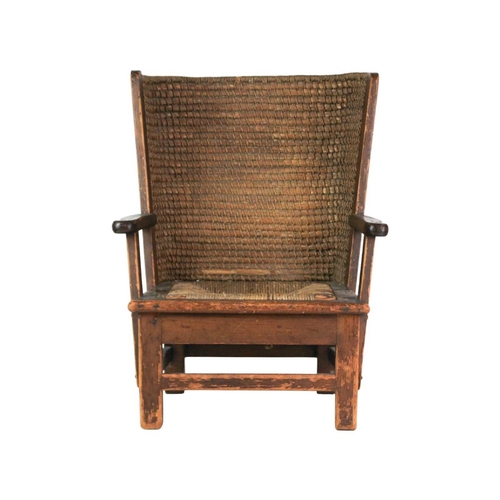 670 - A child's pine Orkney chair. Early 20th century, with straw back and drop-in rush seat, height 55cm,... 