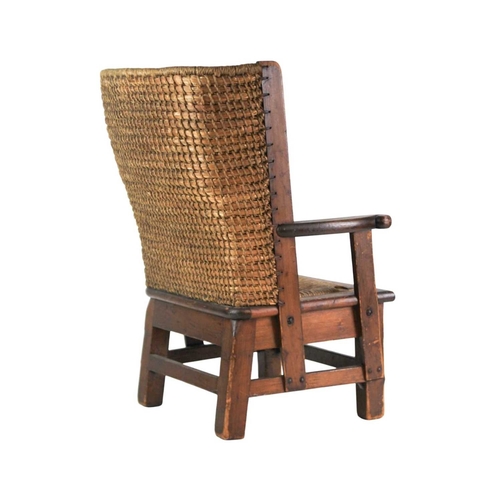 670 - A child's pine Orkney chair. Early 20th century, with straw back and drop-in rush seat, height 55cm,... 