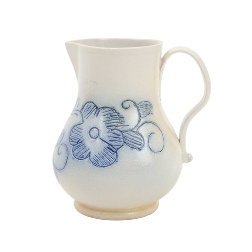 673 - A good scratch blue decorated English salt-glazed baluster cream jug. Circa 1760, with a sparrow bea... 
