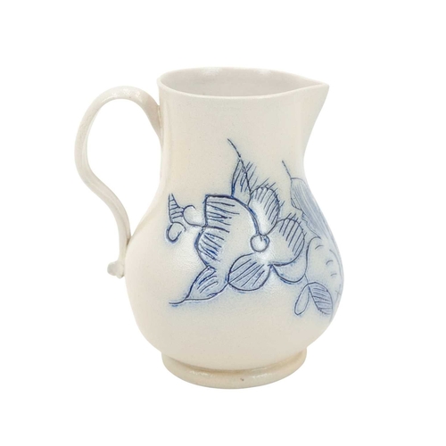673 - A good scratch blue decorated English salt-glazed baluster cream jug. Circa 1760, with a sparrow bea... 