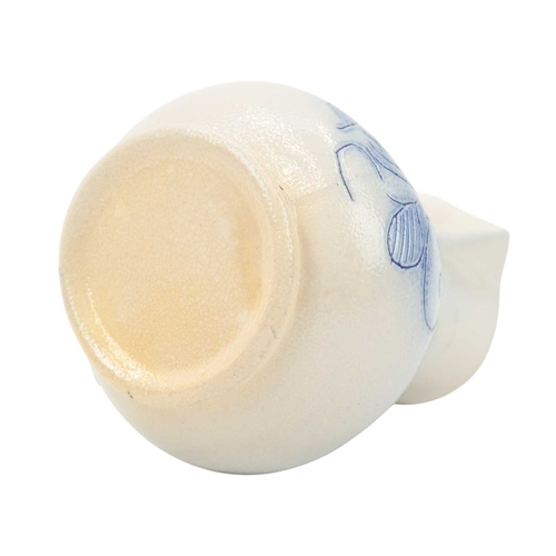 673 - A good scratch blue decorated English salt-glazed baluster cream jug. Circa 1760, with a sparrow bea... 