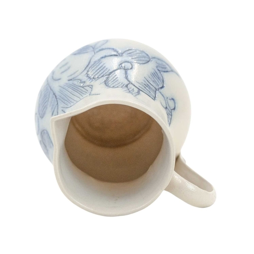 673 - A good scratch blue decorated English salt-glazed baluster cream jug. Circa 1760, with a sparrow bea... 
