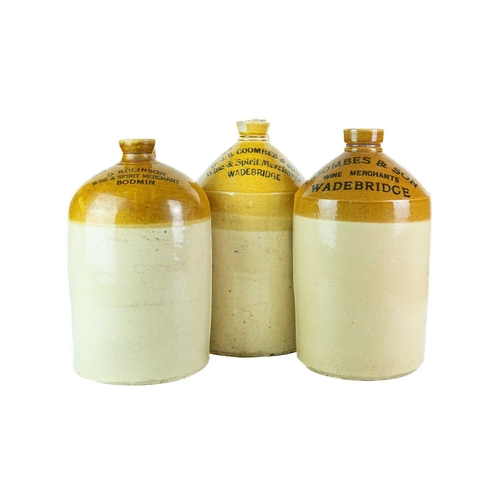 676 - Local interest. Wadebridge and Bodmin stoneware flagons. A 'Coombes & Son Wine Merchant Wadebridge' ... 