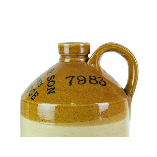 676 - Local interest. Wadebridge and Bodmin stoneware flagons. A 'Coombes & Son Wine Merchant Wadebridge' ... 