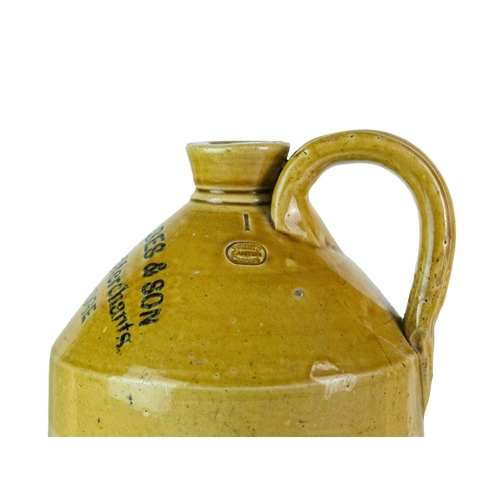 676 - Local interest. Wadebridge and Bodmin stoneware flagons. A 'Coombes & Son Wine Merchant Wadebridge' ... 