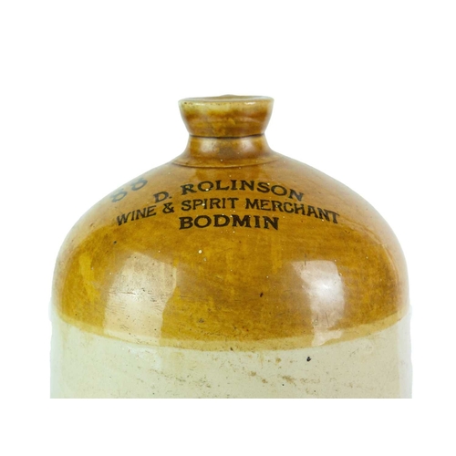 676 - Local interest. Wadebridge and Bodmin stoneware flagons. A 'Coombes & Son Wine Merchant Wadebridge' ... 