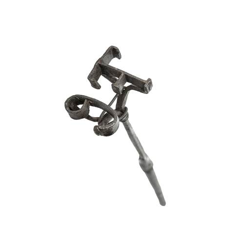 677 - A rustic wrought branding iron. 18th/early 19th century, with the initials TC, turned wood shaft, le... 