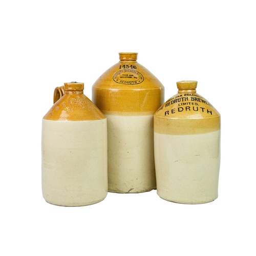 681 - Three Redruth stoneware flagons. Two for Redruth Brewery Co Ltd, height 40cm and smaller, numbered 1... 
