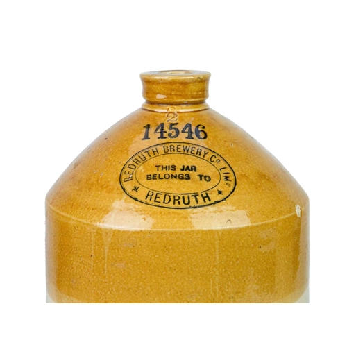 681 - Three Redruth stoneware flagons. Two for Redruth Brewery Co Ltd, height 40cm and smaller, numbered 1... 