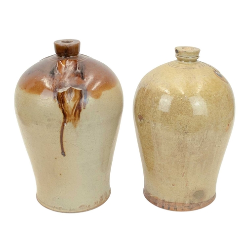 693 - Two slab seal stoneware flagons. 19th century, one for Walker & Routledge, Doncaster 2 gallons, the ... 