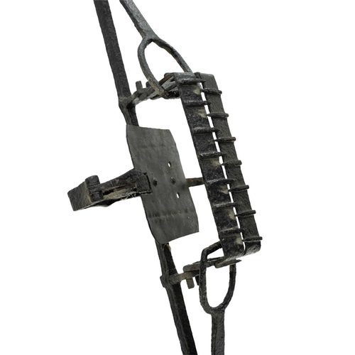 694 - A 19th century wrought iron man trap. With 26cm (10