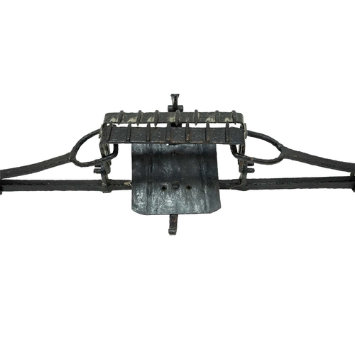 694 - A 19th century wrought iron man trap. With 26cm (10