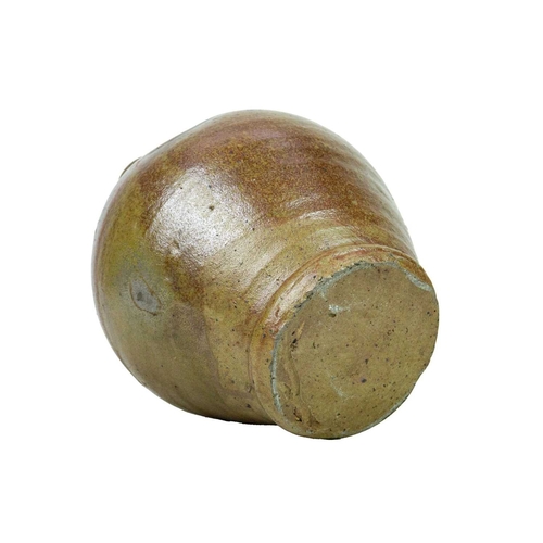 712 - A 17th century German salt-glazed stoneware jug. With a simple loop handle, height 30cm.