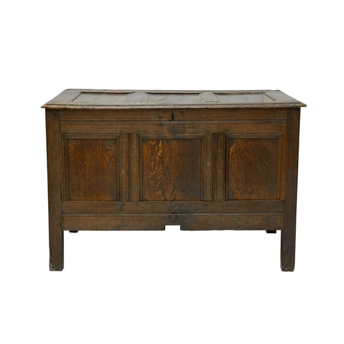 715 - An oak panel coffer. 18th century, height 75cm, width 111cm, depth 56cm.