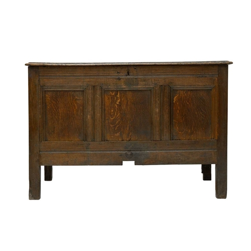 715 - An oak panel coffer. 18th century, height 75cm, width 111cm, depth 56cm.