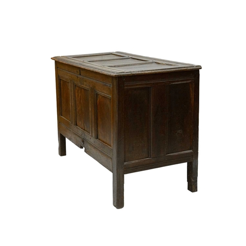 715 - An oak panel coffer. 18th century, height 75cm, width 111cm, depth 56cm.