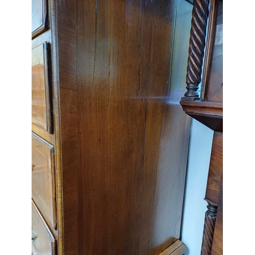 730 - An 18th century walnut chest on chest. The upper part with a moulded cornice above two short and thr... 