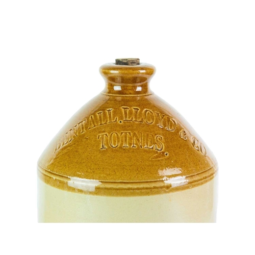 748 - Local interest. Three Launceston stoneware flagons. A 'Francis & Son Wine & Spirit Merchants' flagon... 