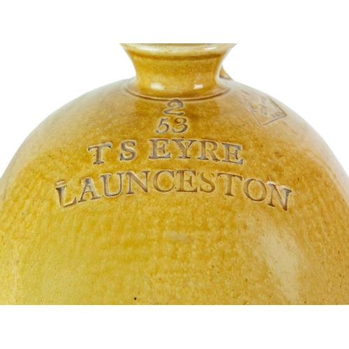 748 - Local interest. Three Launceston stoneware flagons. A 'Francis & Son Wine & Spirit Merchants' flagon... 