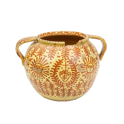 751 - A Continental faience twin handled jar. Possible French or Spanish, 18th/19th century, the ochre gro... 