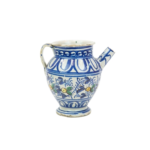 751 - A Continental faience twin handled jar. Possible French or Spanish, 18th/19th century, the ochre gro... 