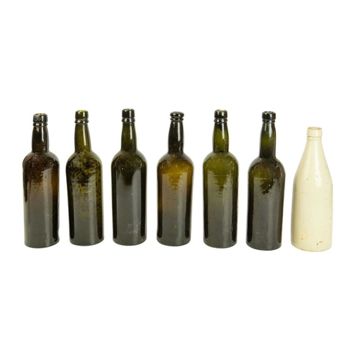 755 - Six 19th century glass wine bottles of dark olive green tint. Various bases. All approximately 30cm ... 