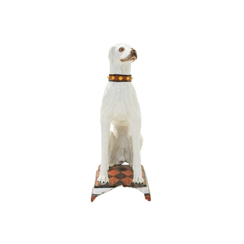 780 - A remarkable life size Italian faience model of a seated greyhound. 19th century, sporting a painted... 