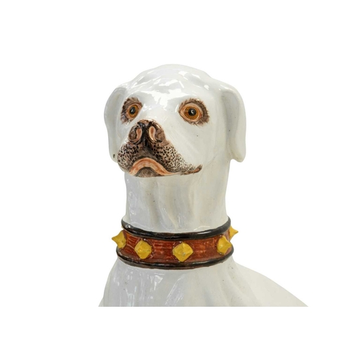 780 - A remarkable life size Italian faience model of a seated greyhound. 19th century, sporting a painted... 