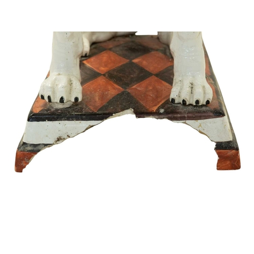 780 - A remarkable life size Italian faience model of a seated greyhound. 19th century, sporting a painted... 