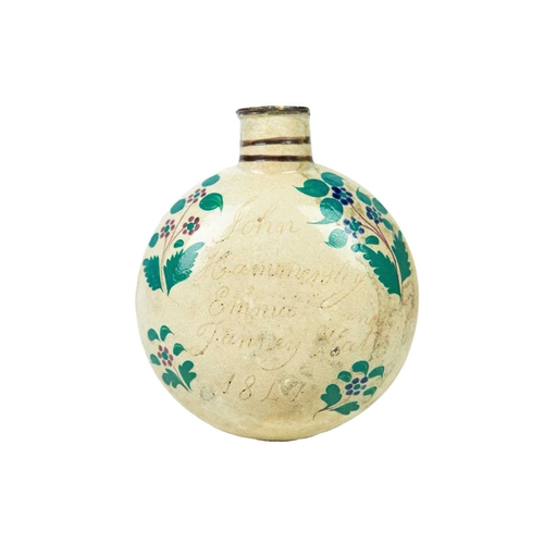 784 - A small documentary pearlware flask. Probably Scottish, painted with floral motifs, and incised with... 