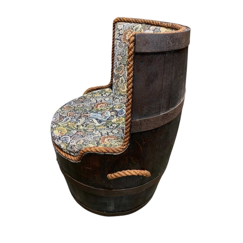 788 - A 19th century oak and metal bound coopered barrel, converted to a seat. On castors. Height 93cm, di... 