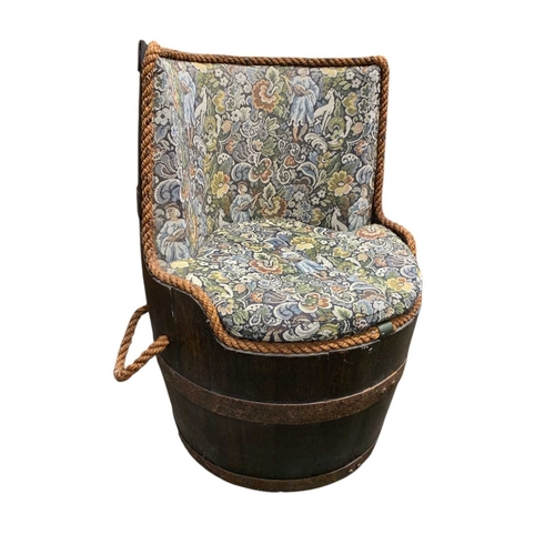 788 - A 19th century oak and metal bound coopered barrel, converted to a seat. On castors. Height 93cm, di... 