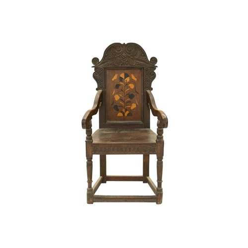 795 - A joined oak and marquetry inlaid wainscot armchair. 17th century in part, probably Yorkshire, with ... 