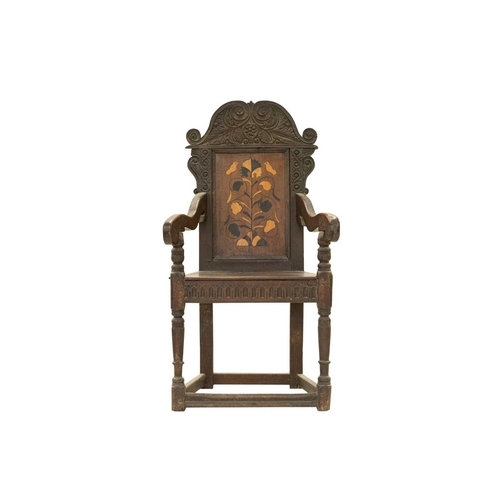 795 - A joined oak and marquetry inlaid wainscot armchair. 17th century in part, probably Yorkshire, with ... 