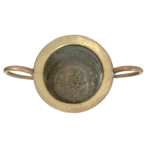 802 - An oversized brass two handled urn or vase. 19th century, possibly a shop advertising promotion piec... 