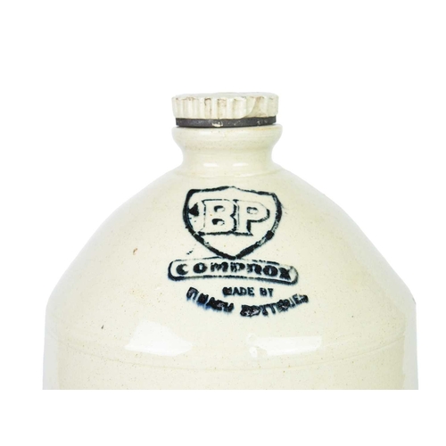 803 - Garagealia. A 'BP Comprox' stoneware demijohn. Made by Timaru Potteries (New Zealand). Height 40cm. ... 