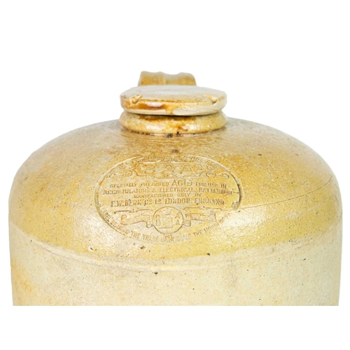 803 - Garagealia. A 'BP Comprox' stoneware demijohn. Made by Timaru Potteries (New Zealand). Height 40cm. ... 