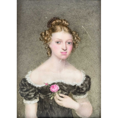 819 - A portrait miniature on porcelain of a young woman. Mid 19th century, wearing a lace trimmed black d... 