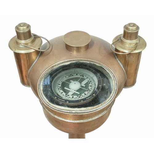 859 - A ship's brass pedestal binnacle compass. Circa 1900, the domed cover with twin side lamps, the comp... 
