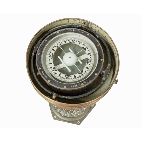 859 - A ship's brass pedestal binnacle compass. Circa 1900, the domed cover with twin side lamps, the comp... 