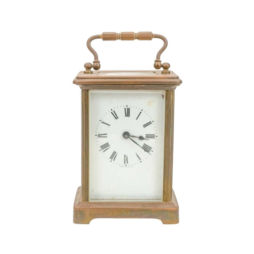 885 - A French brass carriage timepiece. Height 11.5cm, with travel case.
