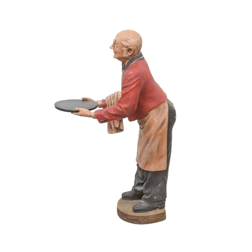 89 - A novelty dumbwaiter. Modelled as an elderly gentleman wearing glasses, red jacket and bow tie, etc.... 