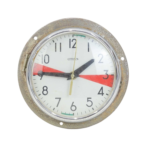 890 - A Citizen ship's radio room clock. Aluminium casing, with side opening to access the movement, which... 