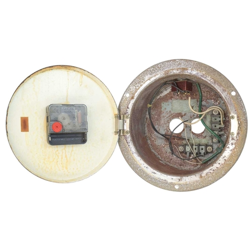 890 - A Citizen ship's radio room clock. Aluminium casing, with side opening to access the movement, which... 