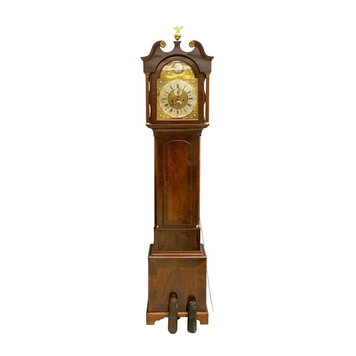 902 - A late George III mahogany longcase clock. The arched brass 32cm dial with silvered chapter ring, ca... 