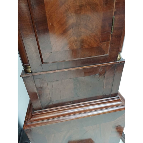 902 - A late George III mahogany longcase clock. The arched brass 32cm dial with silvered chapter ring, ca... 