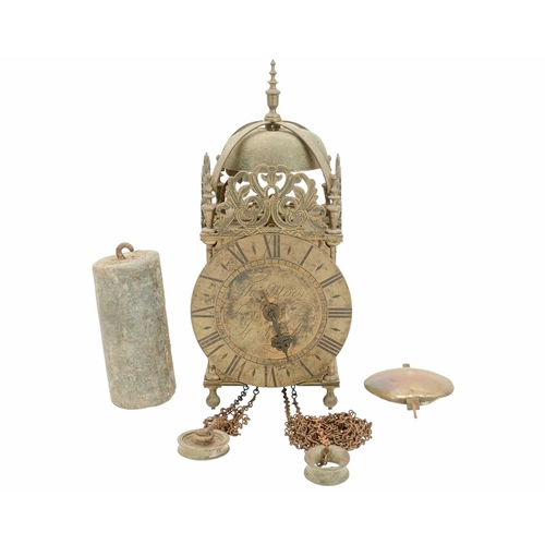 903 - A brass weight driven lantern clock, signed Thos Moore, Ipswich. 19th century, in the 17th century s... 